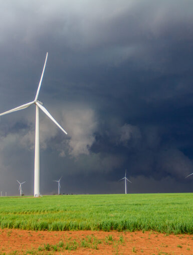 Wall Cloud behind windmills