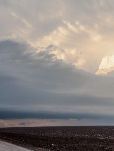 Old and new windmills in front of a supercell in the Texas Panhandle on April 12, 2015