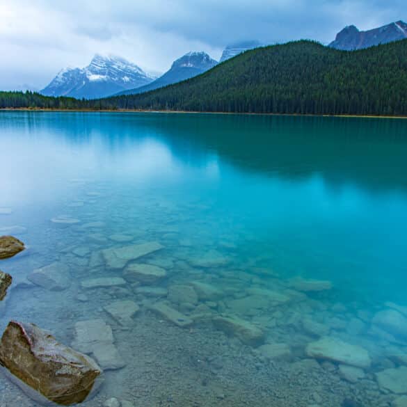 Reflection of the mountains off Waterfowl Lakes in Banff National Park Canada