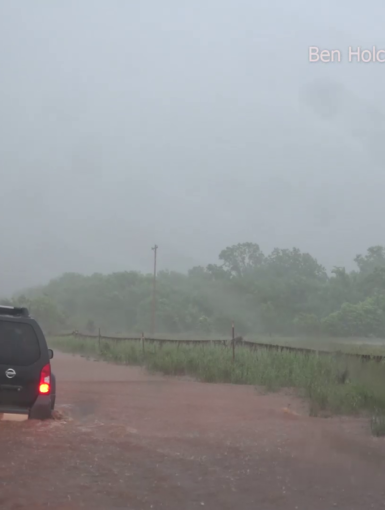 Car drives into flooding